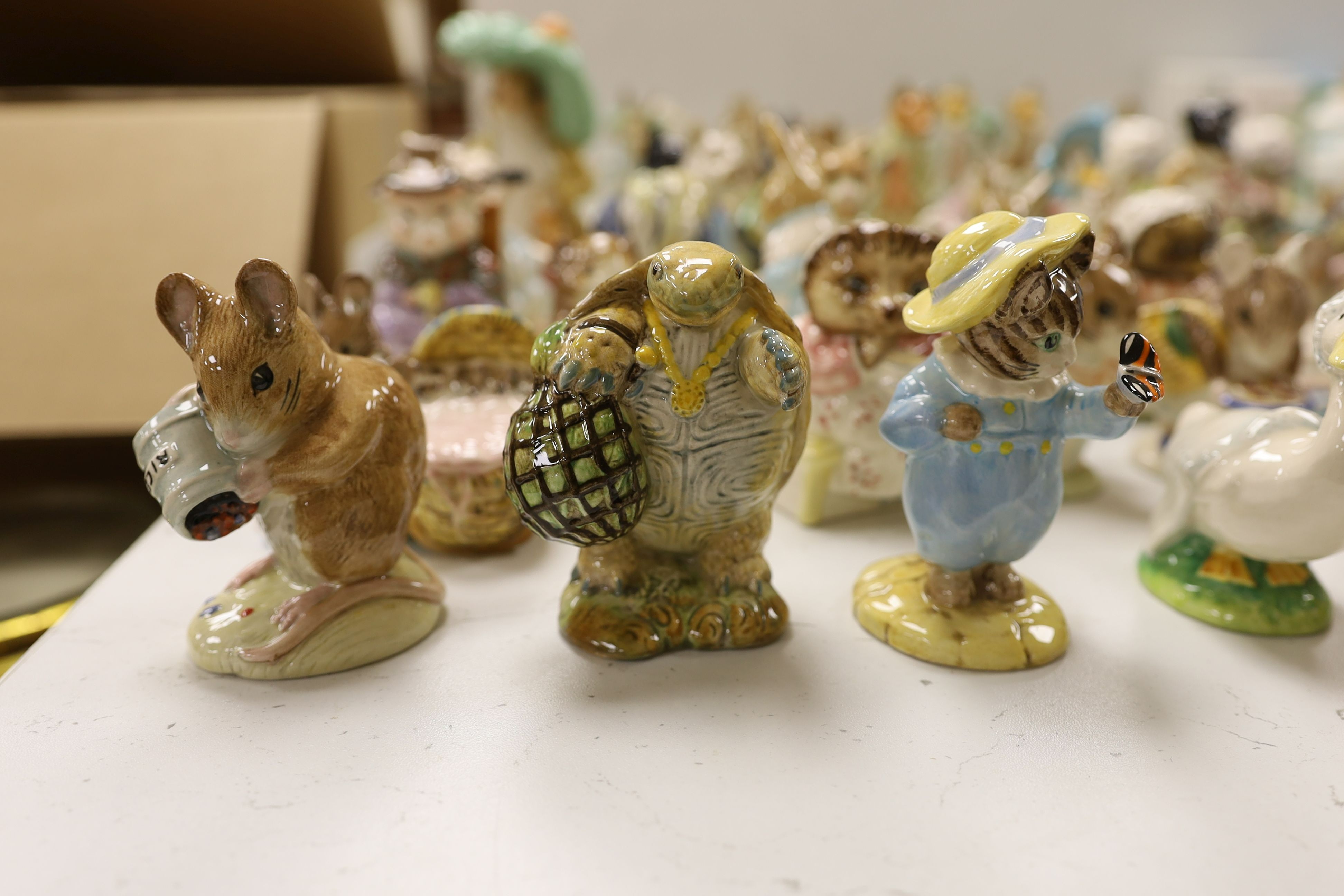 A large collection of various Beswick Beatrix Potter figures, money boxes etc.